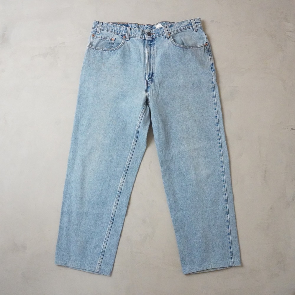 Vintage Levis 550 Relaxed Fit Jeans 38x28 Hemmed 90s Light Wash Tapered Denim